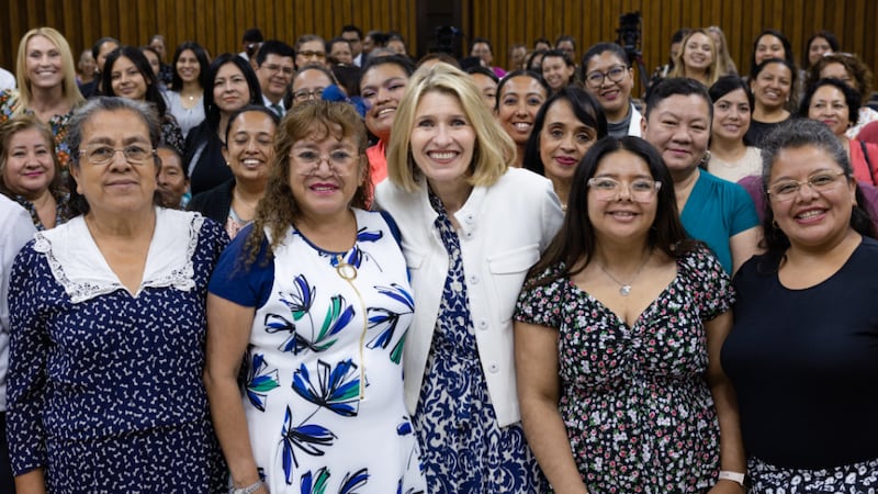 Relief Society General President Camille N. Johnson gathers with local Relief Society leaders during a training in Guatemala City, Guatemala.