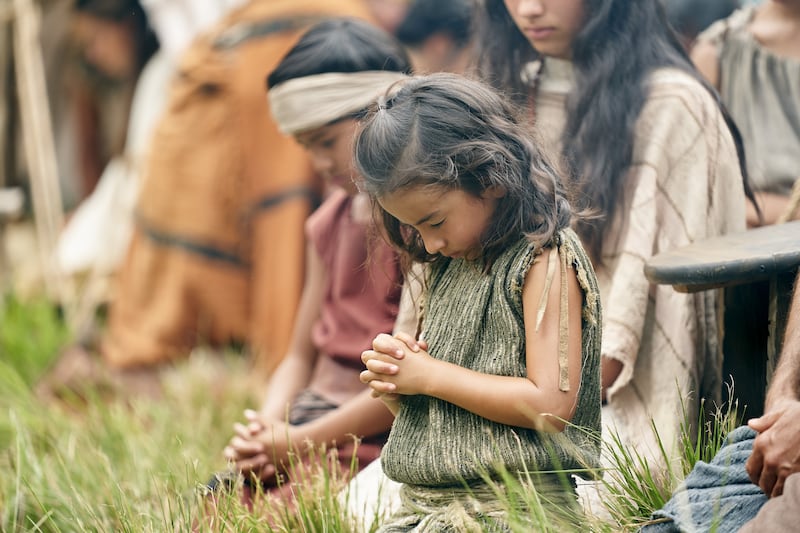 A Nephite child prays in this picture from the Book of Mormon Videos.