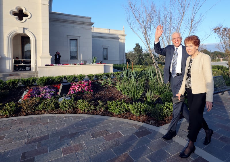 Elder Todd Christofferson and Sister Kathy Christofferson arrive for the dedication of the Salta Argentina Temple.