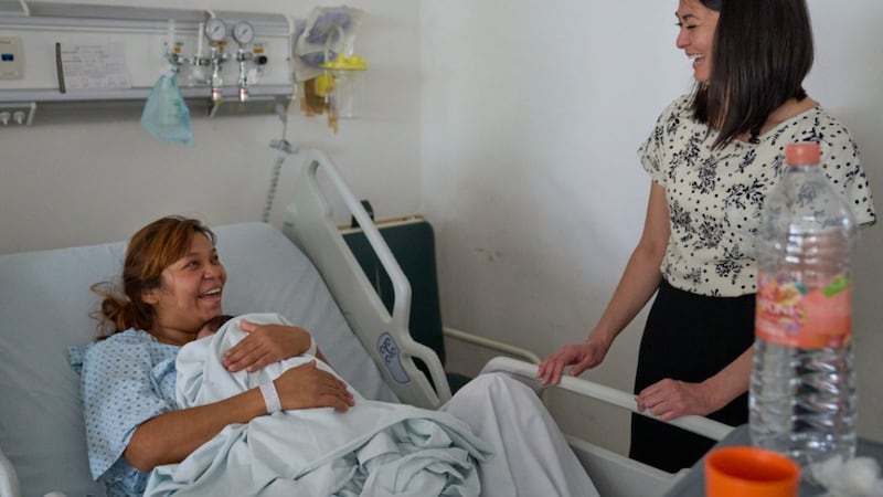 Sister Kristin M. Yee visits a woman and her baby a hospital in Guadalajara, Mexico.