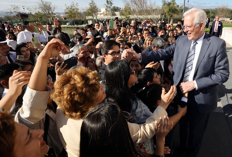 Elder Todd Christofferson greets the crowd after dedicating the Salta Argentina Temple.