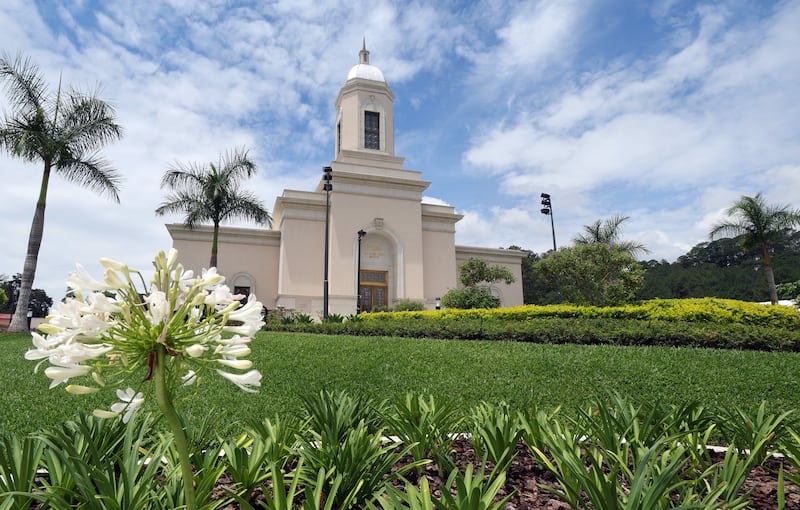 A break in the rain clouds illuminates the Cobán Guatemala Temple with sunshine in Cobán, Guatemala Saturday, June 8, 2024.