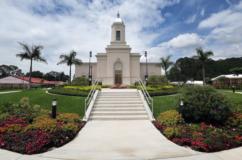 A break in the rain clouds illuminates the Cobán Guatemala Temple with sunshine in Cobán, Guatemala Saturday, June 8, 2024.