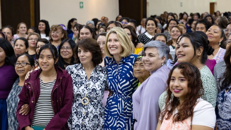 Relief Society General President Camille N. Johnson takes a group photo with Relief Society sisters in Guatemala City, Guatemala.