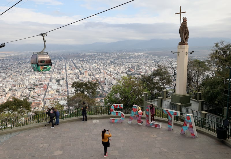 People visit the top of Cerro San Bernardo.