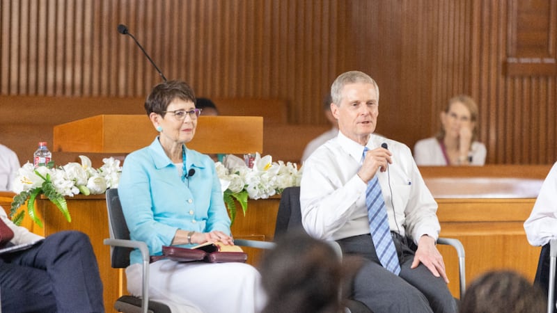 Elder David A. Bednar and Sister Susan Bednar take questions from youth in Accra, Ghana.