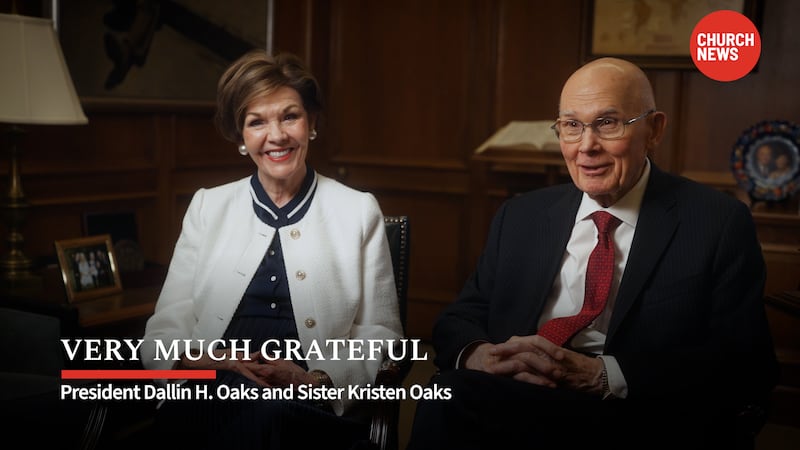 President Dallin H. Oaks, first counselor in the First Presidency, right, and Sister Kristen M. Oaks sit on chairs in their home in this screenshot from the Church News video "Very Much Grateful."