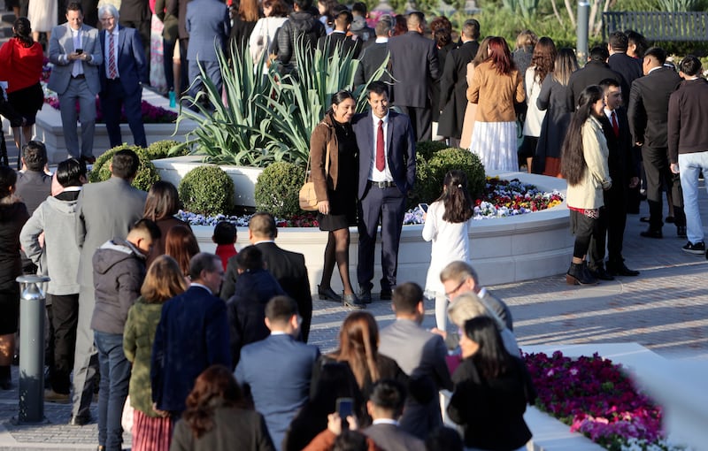 People wait outside for the dedication of the Salta Argentina Temple.